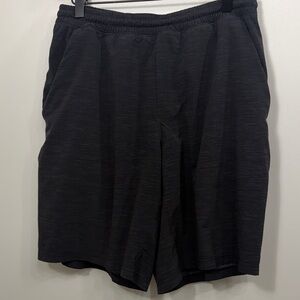 Lululemon men’s black grey lined short size large.